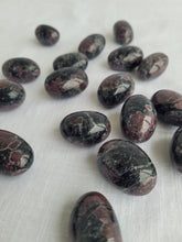 Load image into Gallery viewer, Garnet in Arfvendsonite Tumbles