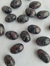 Load image into Gallery viewer, Garnet in Arfvendsonite Tumbles